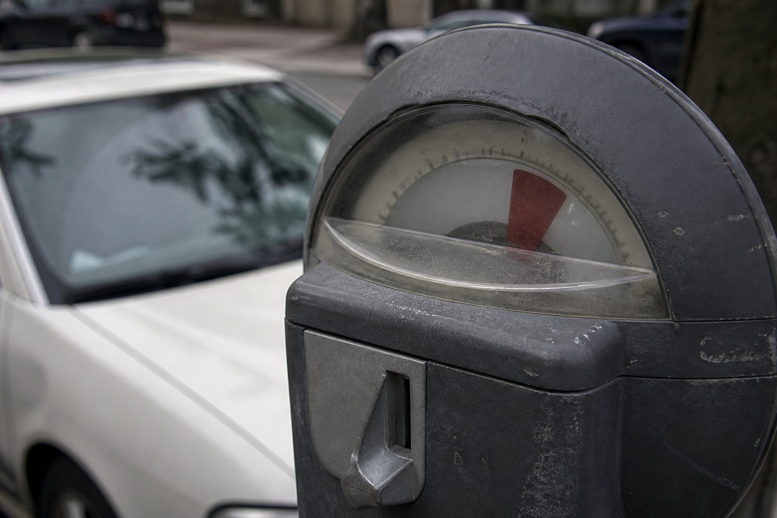 A street parking meter showing time remaining on its dial