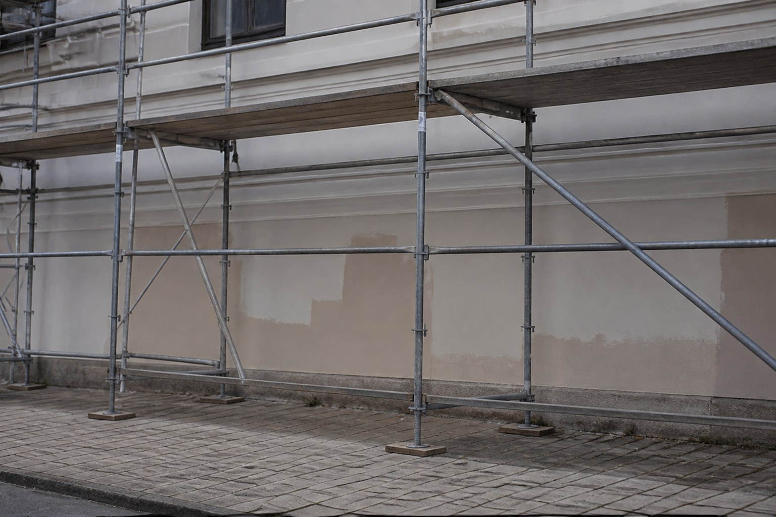 Scaffolding against a finished wall with no work in progress